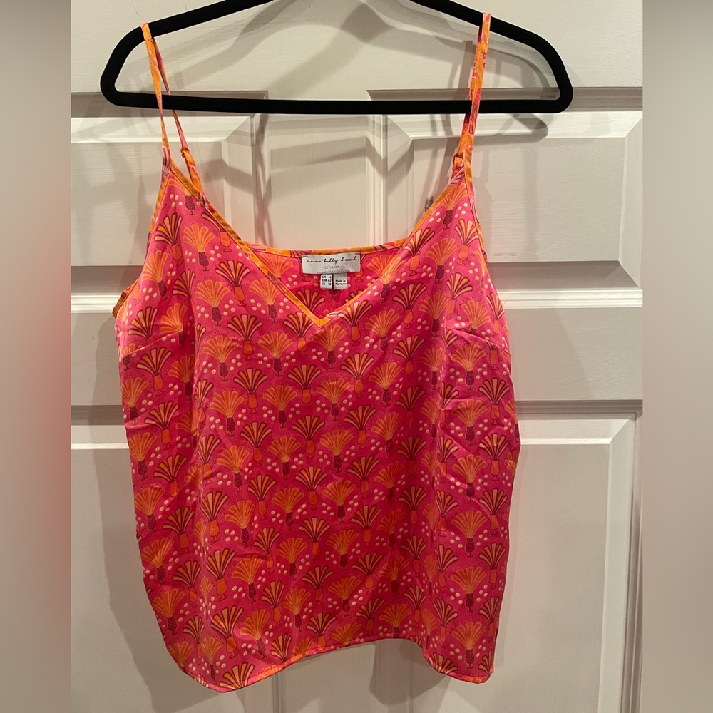 Never fully dressed pink patterned tank.